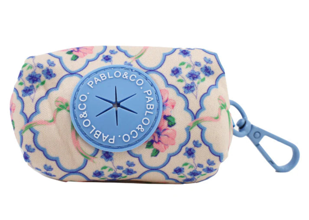 Pablo & Co Petal poop bag holder in floral print with clip and rubber waste bag dispenser for dog walks